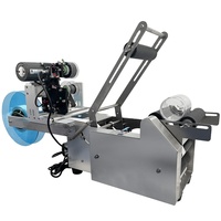 Machine d'étiquetage et de codage semi-automatique de bureau LT-50D pour l'industrie alimentaire, bouteilles rondes - Économie d'énergie et haute sécurité