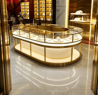Vitrine d'exposition élégante en verre avec éclairage LED pour bijouterie, idéale pour les magasins de détail et centres commerciaux, pour la présentation de la marque et la conception de bijouteries.