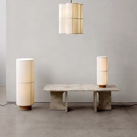 Table basse rectangulaire minimaliste en pierre de grotte jaune, design moderne et simple, style luxe léger italien