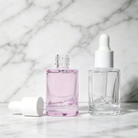 Flacons compte-gouttes en verre premium de 10 ml avec embouts en caoutchouc pour sérum de soin de la peau et huile essentielle, forme ronde, en stock