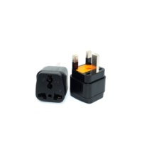 Adaptateur de prise de voyage économique convertisseur de prise de courant personnalisable 110V évalué pour les besoins de charge des pays européens et asiatiques du Royaume-Uni AU