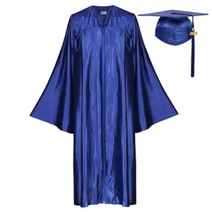 Venta al por mayor de color personalizado brillante vestido de graduación para niños ceremonia clásico niño vestido de graduación y gorra con borla