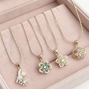 สร้อยคอจี้เพชร CZ ชุบทอง 18K สุดหรูสำหรับผู้หญิง ประดับด้วยดอกไม้เซอร์คอนสีเขียว รูปทรงดอกคามิลเลียแบบโปร่ง ขายส่ง - Product Image 5