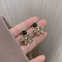Haut de gamme nouveau élégant élégant argent aiguille noir rond cubique Zircon arc boucles d'oreilles femmes mode strass diamants arc boucles d'oreilles