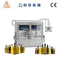 Machine de remplissage entièrement automatique adaptée aux huiles, pâtes et liquides visqueux tels que l'huile d'olive