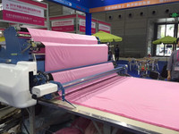 95% de réduction CNC épandeur de tissu avec épandeur de tissu automatique de Chine largement utilisé pour l'industrie du vêtement