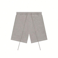 Shorts de survêtement essentiels en coton pour hommes, couleur avoine clair, avec lettres imprimées en flocage noir – Vente directe usine 2026