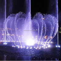 Fontaine musicale extérieure moderne en acier inoxydable contrôlée par DMX, avec lumières et jets d'eau dansants pour terrasse et sol