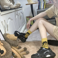 Vente en gros de chaussettes de personnages de dessins animés fantaisie chaussettes unisexes en coton graphique fou et drôle pour hommes