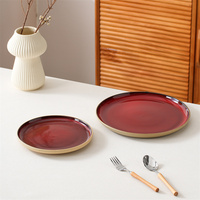 Ventes chaudes Vaisselle Assiette à apéritif Assiette plate en céramique émaillée au four rouge Assiettes à pâtes pour restaurant Banquet de mariage