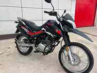 Moto d'occasion économique Haojue NK150 150cc à refroidissement par air, haute garde au sol pour la conduite urbaine et sur routes accidentées