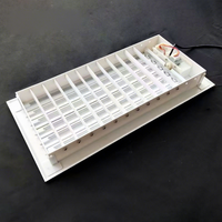 Grille de ventilation électrique moderne carrée en plastique et alliage d'aluminium avec télécommande pour un flux d'air précis, montage mural ou au plafond, extérieur