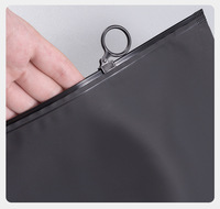 Sac à fermeture éclair coulissante noir mat de luxe avec logo personnalisé, fermeture éclair circulaire à anneau pour l'emballage des vêtements, sacs en PE givrés imperméables
