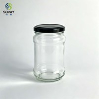 Botol kaca bening bulat tinggi 300ml, sedikit melengkung, leher ulir, dengan tutup logam hitam untuk kemasan madu, selai, saus, dan makanan.
