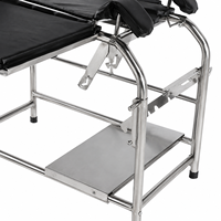 Table d'examen gynécologique en acier inoxydable pour hôpital avec dossier et repose-jambes réglables