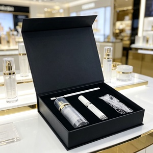 Boîtes cadeaux rigides magnétiques noires personnalisées avec insert en mousse EVA sur mesure pour l'emballage de sérum de soin de la peau et de coffrets beauté - Product Image 1