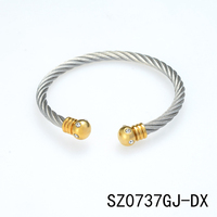 Bracelet manchette torsadé en acier inoxydable pour femme, avec boule ronde, crâne et cristaux, couleur argent et or, vente en gros de bijoux