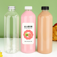 Bouteilles de boisson rondes transparentes en PET de 1000 ml (32 oz) avec bouchons à vis pour boissons énergisantes, café, vodka et bière - 50 pièces/carton