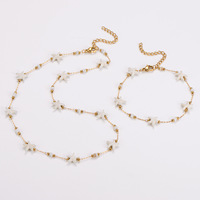 Ensemble de bijoux classique en acier inoxydable plaqué or 18 carats avec collier et bracelet ajustables, style océan et plage, pour femme