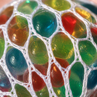 Jouet sensoriel anti-stress en forme de boule de raisin en plastique coloré, rempli de poudre dorée, pour enfants