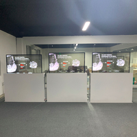 Écran tactile numérique OLED transparent de 55 pouces sur pied pour affichage dynamique en centre commercial