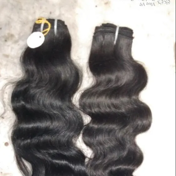 hand made wafting curly hair. Unprocessed quality remy hair made hand made waft.Used three thread for weaving process