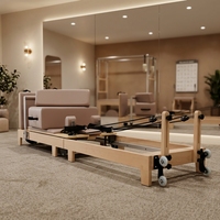 Reformer de Pilates pliable en bois de chêne et d'érable, fabriqué en usine, pour club, studio, domicile et entraînement de réadaptation