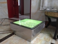 Table basse à bulles d'eau sensorielle en acrylique et acier inoxydable avec lumière LED
