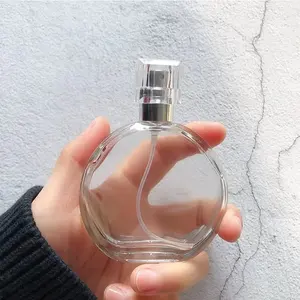 Lüks doldurulabilir parfüm şişeleri 50 ml 100 ml toptan boş yuvarlak sprey cam parfüm yağı şişeleri