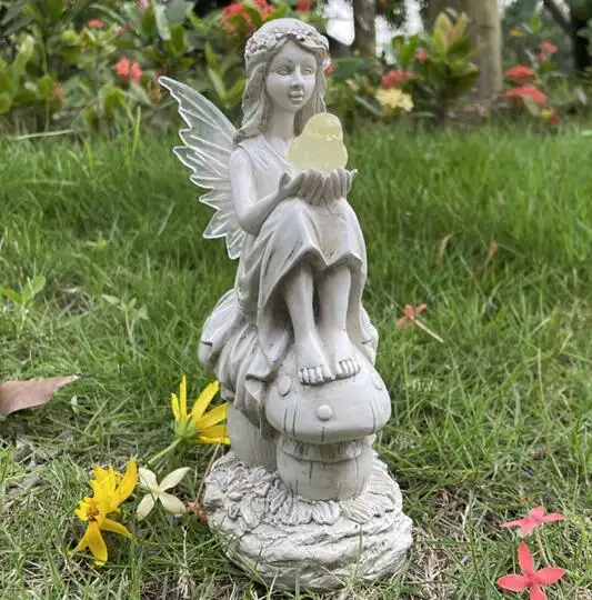 太陽エネルギー天使花妖精保持鳥の装飾創造的な発光ソーラーランプ樹脂中庭の装飾