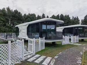 Prefab Hotel Homestay Resort portátil OEM móvil al aire libre dirigible espacio cápsula casa para parejas vacaciones cabaña estrella techo casa - Product Image 3