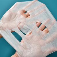 Matériel de masque facial conception personnalisée feuille de masque facial en microfibre à cellules de neige feuille de masque facial sec soyeux