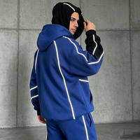 Ensemble de survêtement personnalisé OEM avec fermeture éclair, design tendance, passepoil cousu, cagoule et pantalon de survêtement pour femme