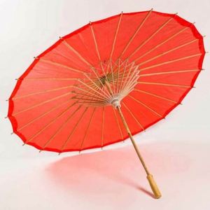 Parasol artisanal rouge de 84 cm en bambou et papier de coton avec logo personnalisé pour les mariées et les demoiselles d'honneur - Product Image 1