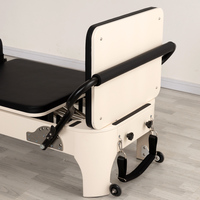 Lit d'entraînement de Pilates portable personnalisé, blanc, en bois arrondi, avec lit de Pilates confortable pour le renforcement du tronc