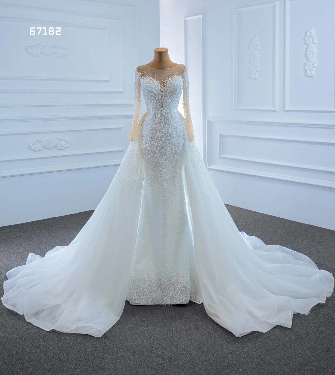 Ivory train sew on dress USD480