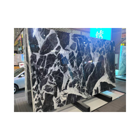 Carreaux de marbre noir bulgare au design moderne, table d'alto Calacatta polie, mur pour hôtel avec solution de design graphique