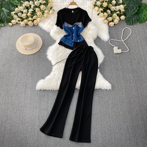 Bộ đồ hai mảnh gồm áo khoác denim ngắn kiểu Mỹ và quần ống loe cạp cao - Product Image 2