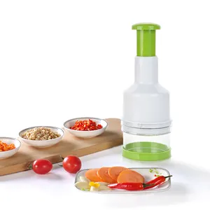 Venta caliente Ecológico Accesorios de cocina de alta calidad Gadgets Prensa manual Cebolla Ajo Cortador de verduras Cebolla Picadora