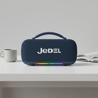 Haut-parleur portable en tissu TWS sans fil, modèle JL5.4, 15W, avec lumière RGB, carte TF, USB, FM, idéal pour les fêtes en extérieur – Vente chaude directe usine