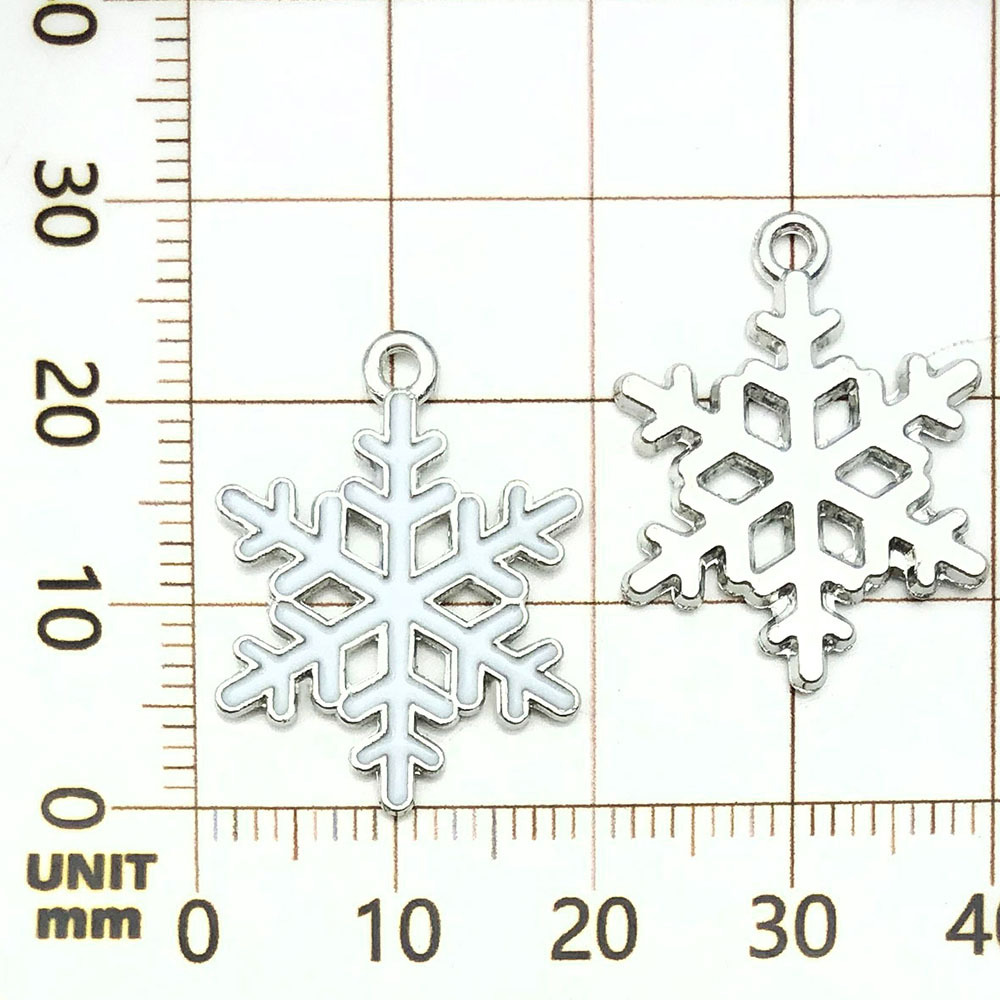 Un flocon de neige de Noël blanc saupoudré d'huile - 1,6g - 24*19mm - 19648