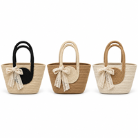 Nouveau Sac Fourre-tout Tressé en Corde de Coton pour l'Été, Style Minimaliste, pour la Plage et les Vacances, Sac à Main de Voyage pour Femme avec Deux Pompons, Imperméable