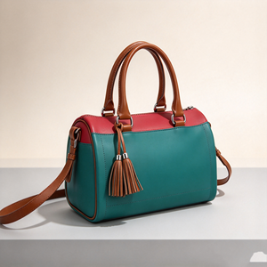 Bolso de mano moderno con asa superior en contraste, espacio interior espacioso y borla decorativa para viajes de fin de semana - Product Image 1