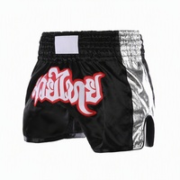 Thai-Schriftstickerei Muay Thai Shorts, Goldstreifen-Seitenpanel Polyester Boxershorts, Breiter Bund Ringausrüstung OEM Großhandel