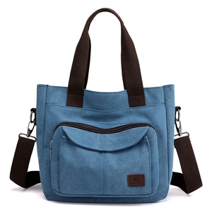 Sacs fourre-tout ajustables à bandoulière avec broderie – Imperméables et portables, fermeture éclair sécurisée, sangle confortable pour une utilisation nomade - Product Image 3