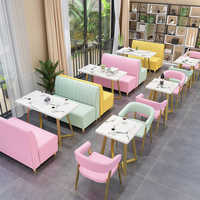 Ensemble de mobilier de restaurant et café en marbre : canapé, banquette, table et chaises pour restaurant