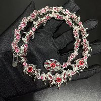 Chaîne à maillons Hip-Hop plaquée or blanc Collier ras du cou Épines aux yeux rouges Chaîne parasite Design exagéré Bijoux de mode