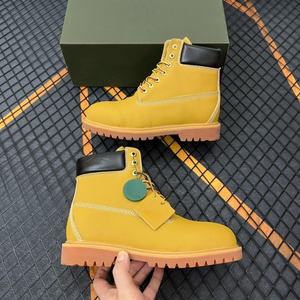Botas de senderismo de lujo para hombre, diseño original, de cuero genuino, impermeables, amarillas, botas de trabajo para hombre y mujer, zapatos de seguridad cálidos. - Product Image 1