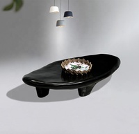 Table basse ovale en pierre de pavé minimaliste italienne, en panneau haute densité, noire, minimaliste, salon, petite unité, table à thé
