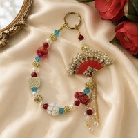 Breloque de téléphone de luxe rouge en forme d'éventail, perlée, avec pompon en perles, style chinois, porte-clés doré, pendentif de sac, fait main, vente en gros